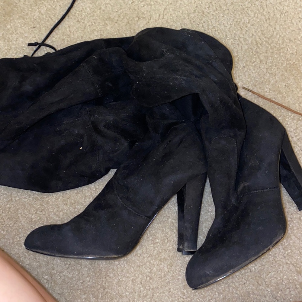 Black thigh boots.